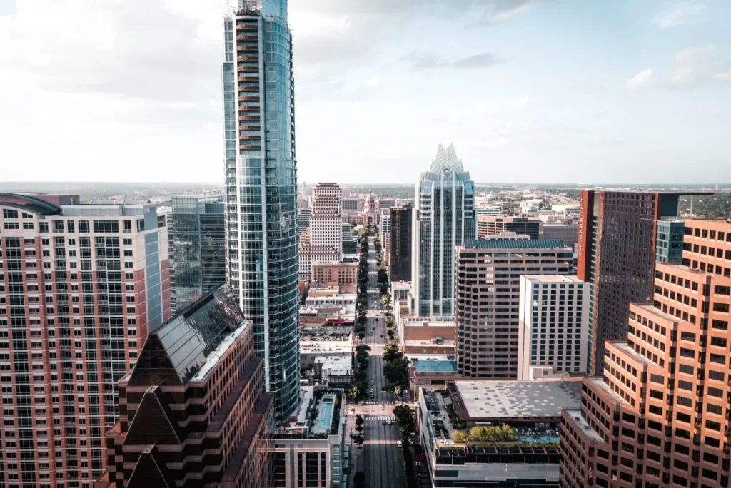 Aerial view of downtown Austin skyline, representing local businesses that partner with apprenticeship programs through Workforce Solutions Capital Area
