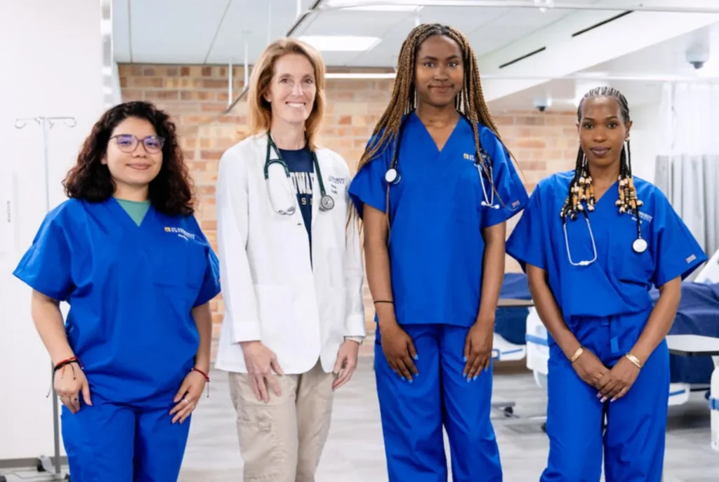4 medical professionals in a clinical setting representing nursing careers services through Workforce Solutions partnered with Central Texas Healthcare