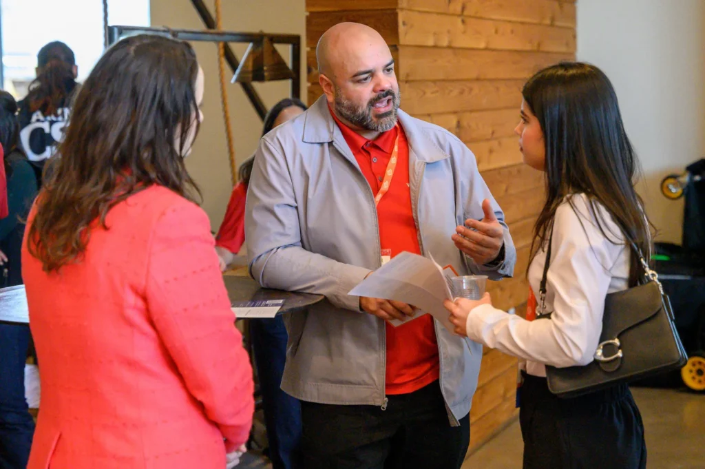 A young adult at a career event, representing youth career services at Workforce Solutions Capital Area